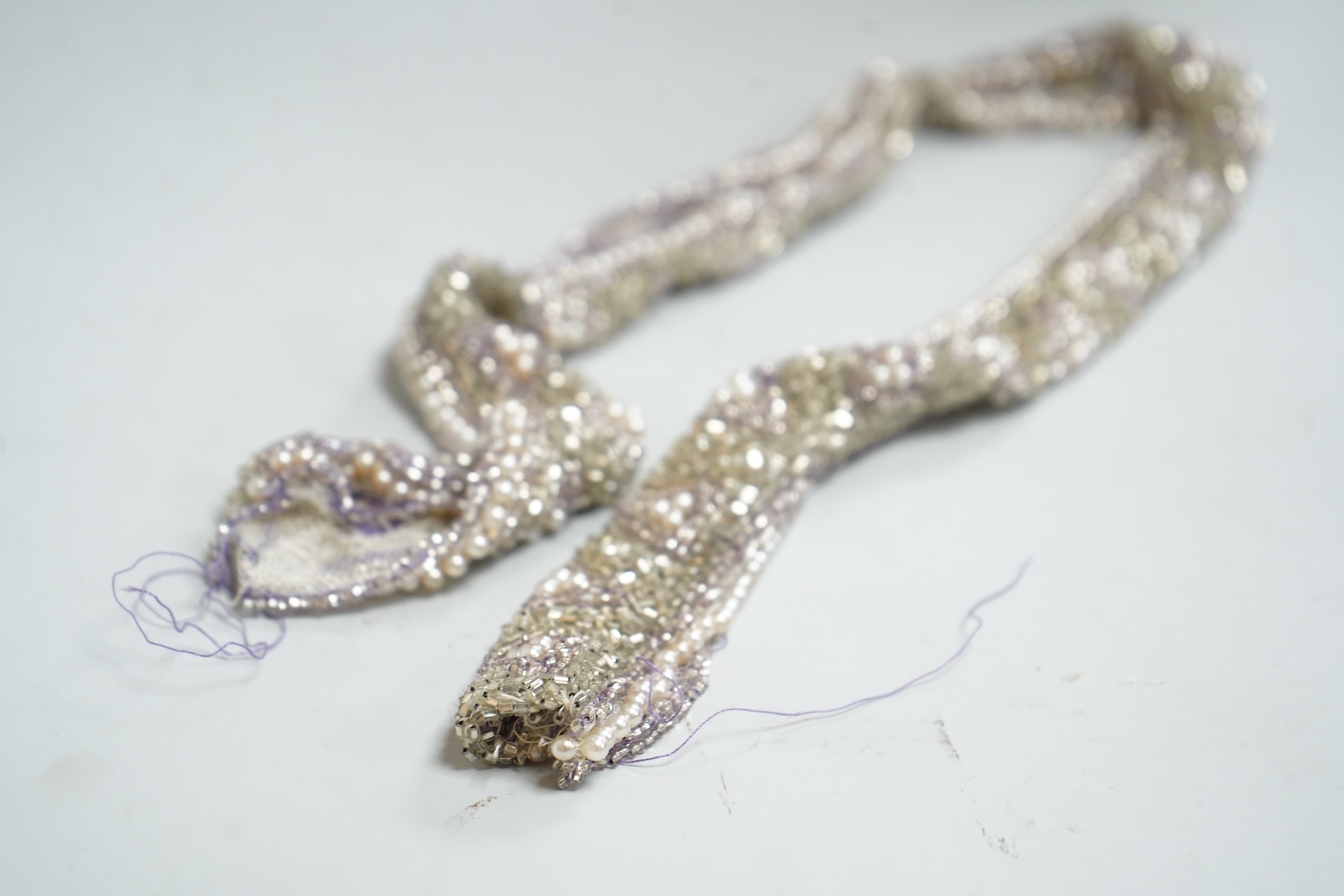 A beaded jacket, beadwork length and 1960's scarf
